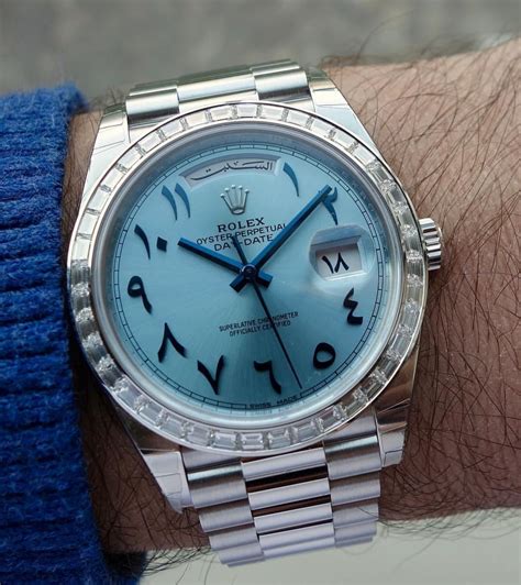 rolex watch with arabic numerals